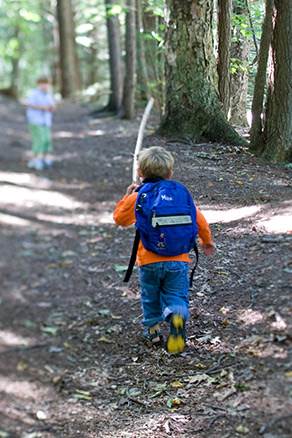 A young child hiking