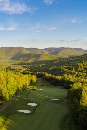 An aerial shot of hole seven at Sunday River Golf Club on a beautiful late summer day 