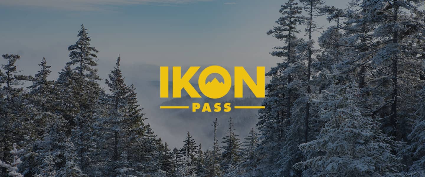 A snowy day at Sunday River with the Ikon Pass logo