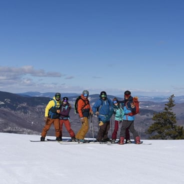 Group of ski friends atop Jordan bowl