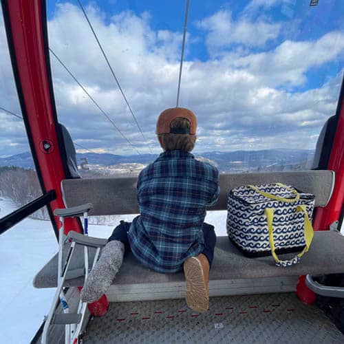 kid on gondola looking out