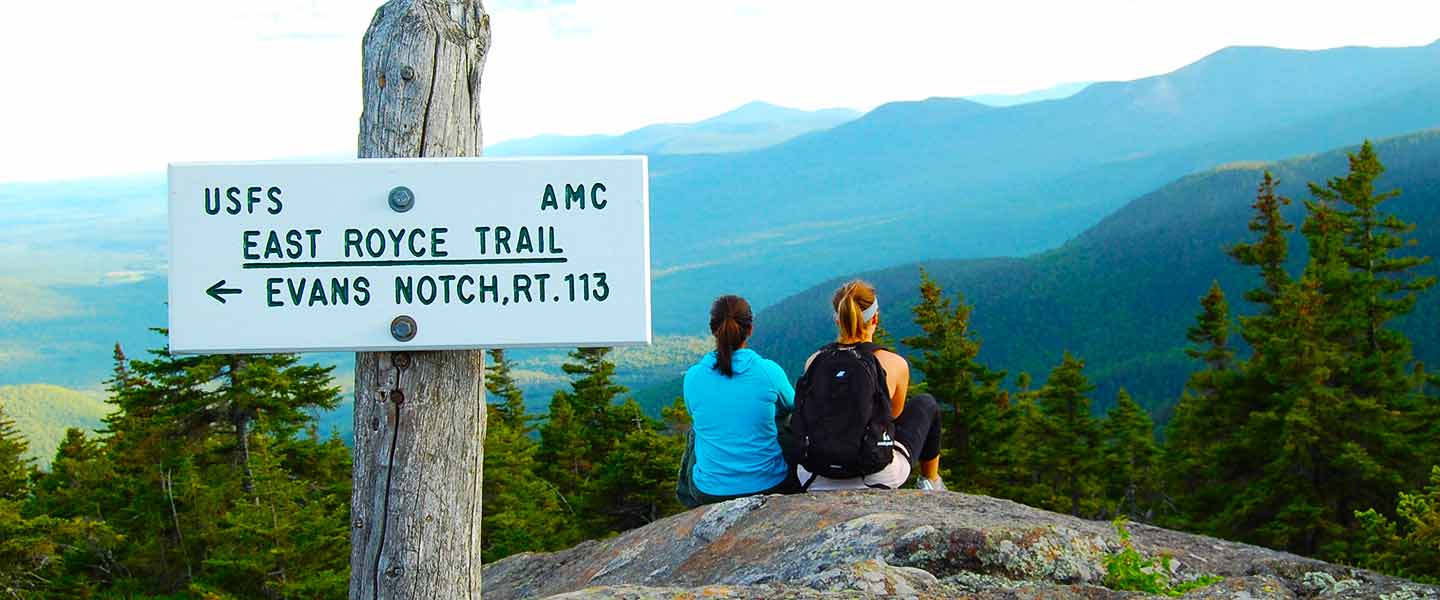 Hikers enjoying the view at the summit