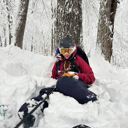 in the trees skiing 