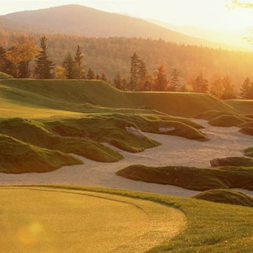 Golf course green sunrise in spring time