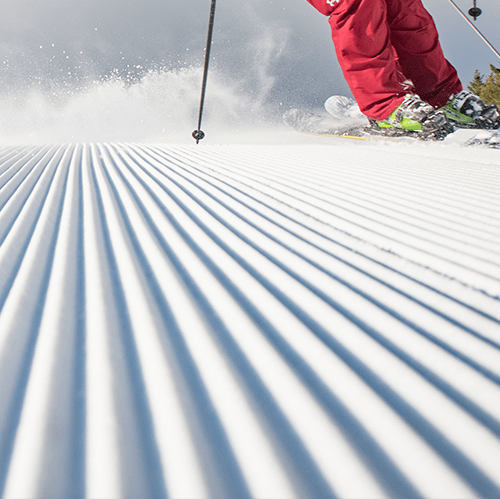 Man carving turn on corduroy